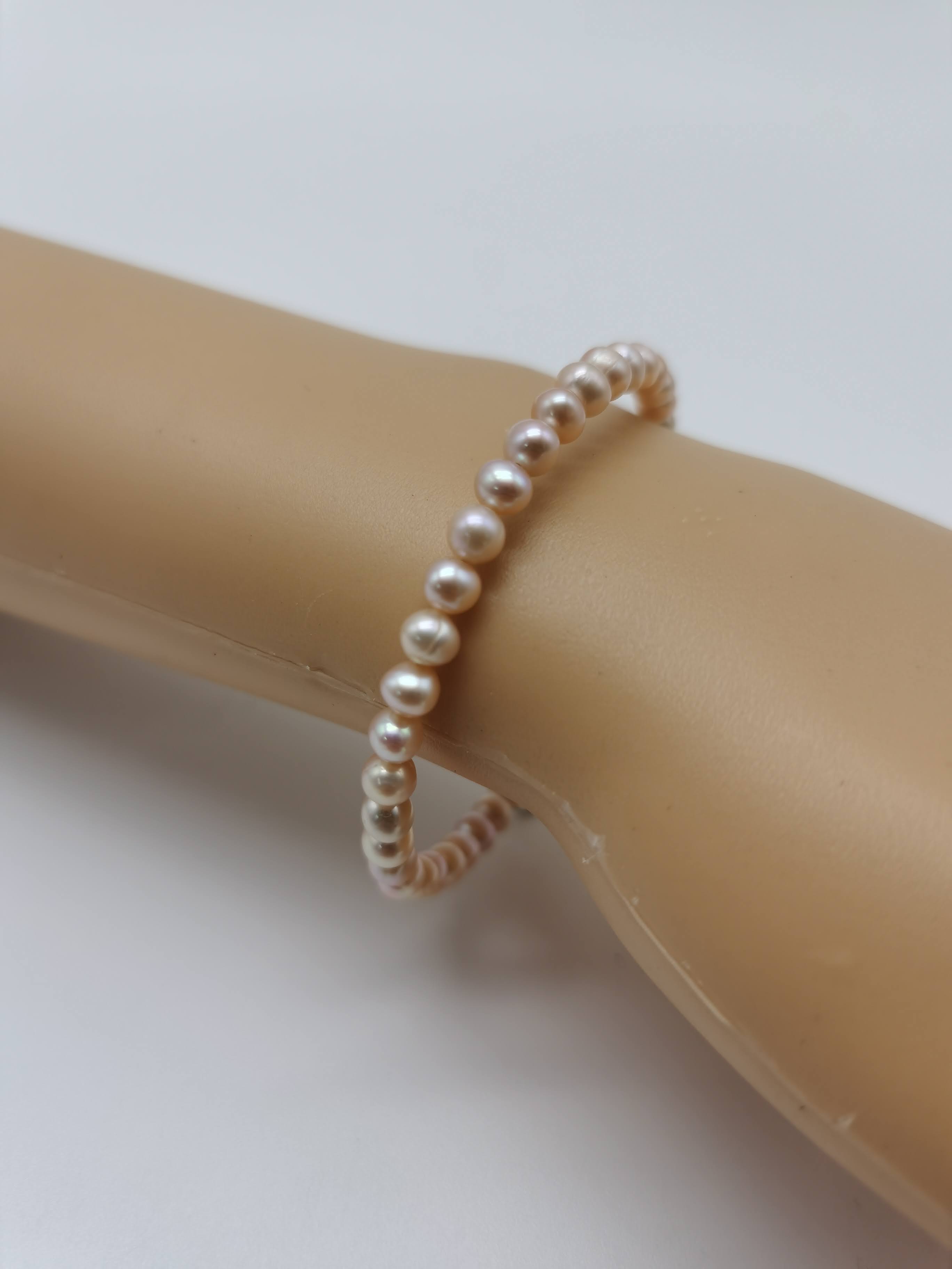 GELANG BESI WANITA MUTIARA AIR MASIN WARNA PINK