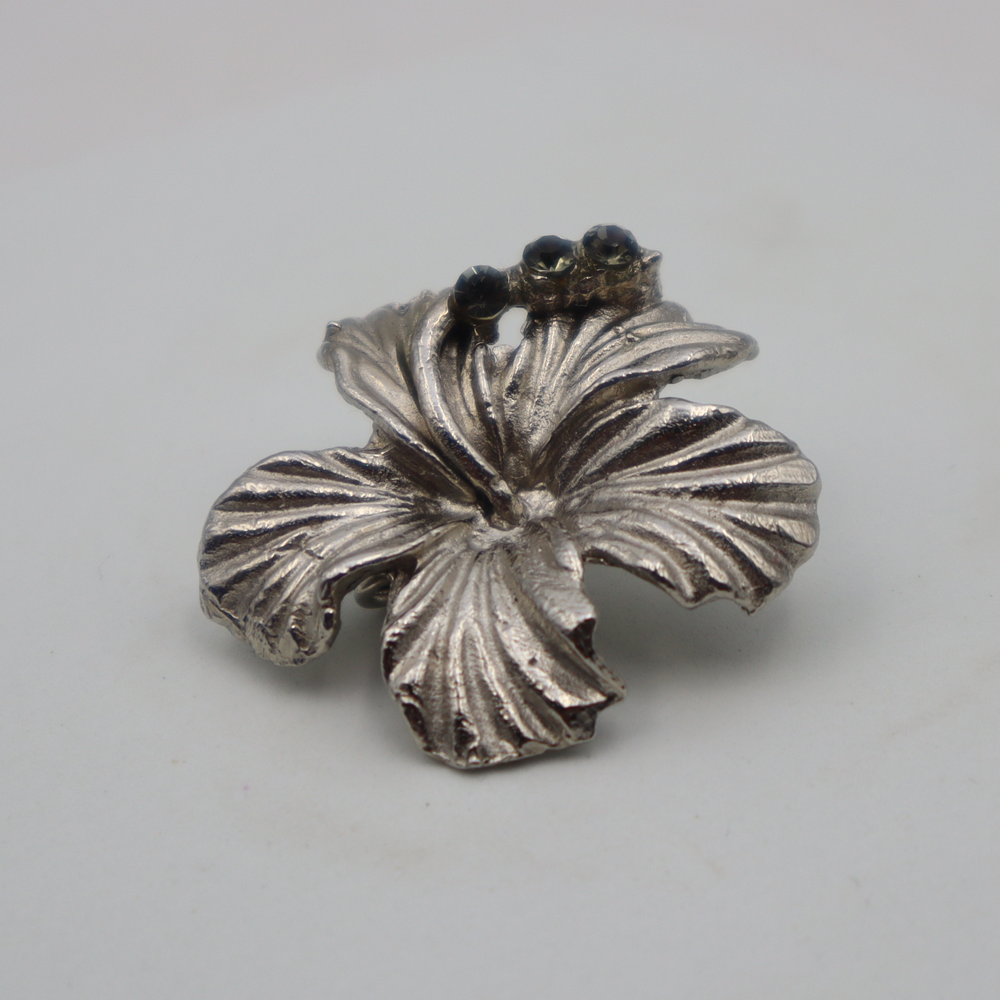 KERONGSANG BUNGA RAYA