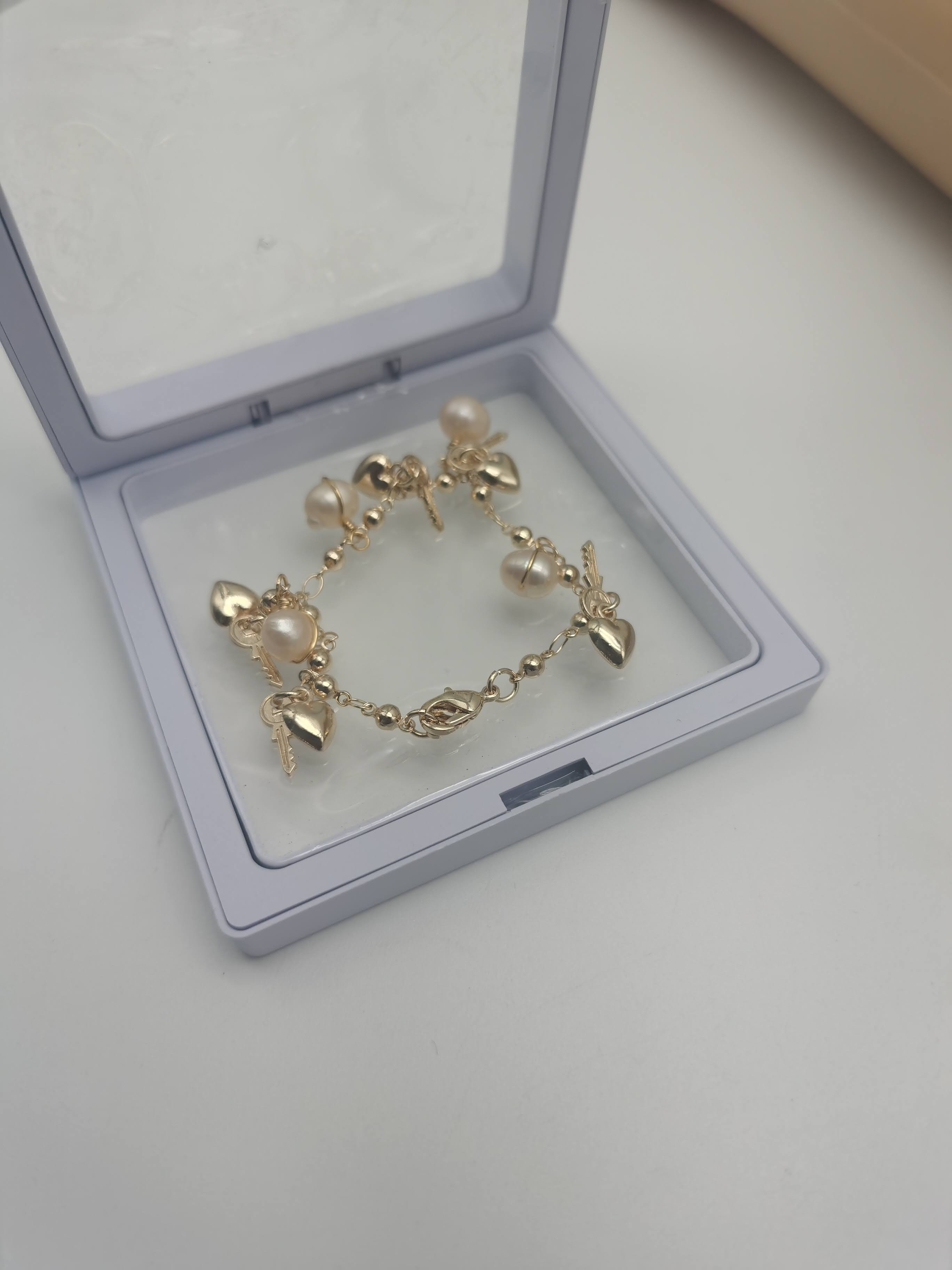 GELANG MUTIARA ROSEGOLD ( PINK)