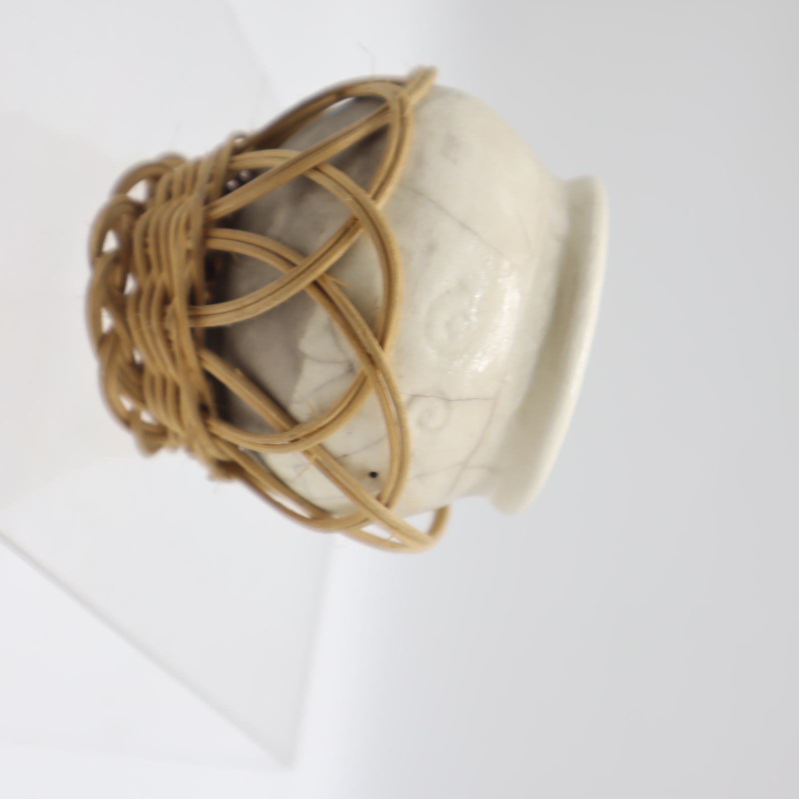 VASE IN WOVEN BASKET